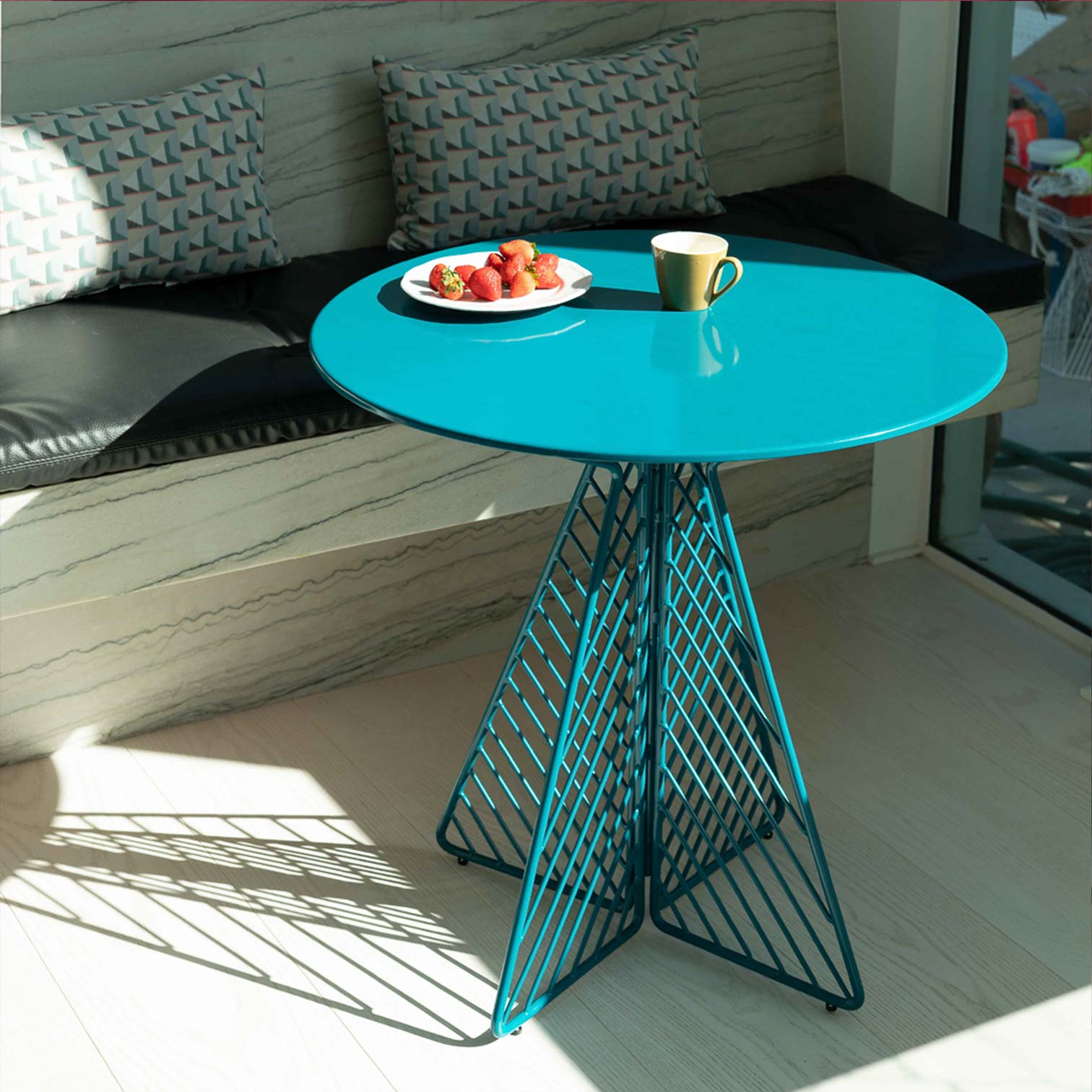 Cafe Table shown in Peacock Blue with Round Top. Pictured in kitchen interior of Los Angeles home.
