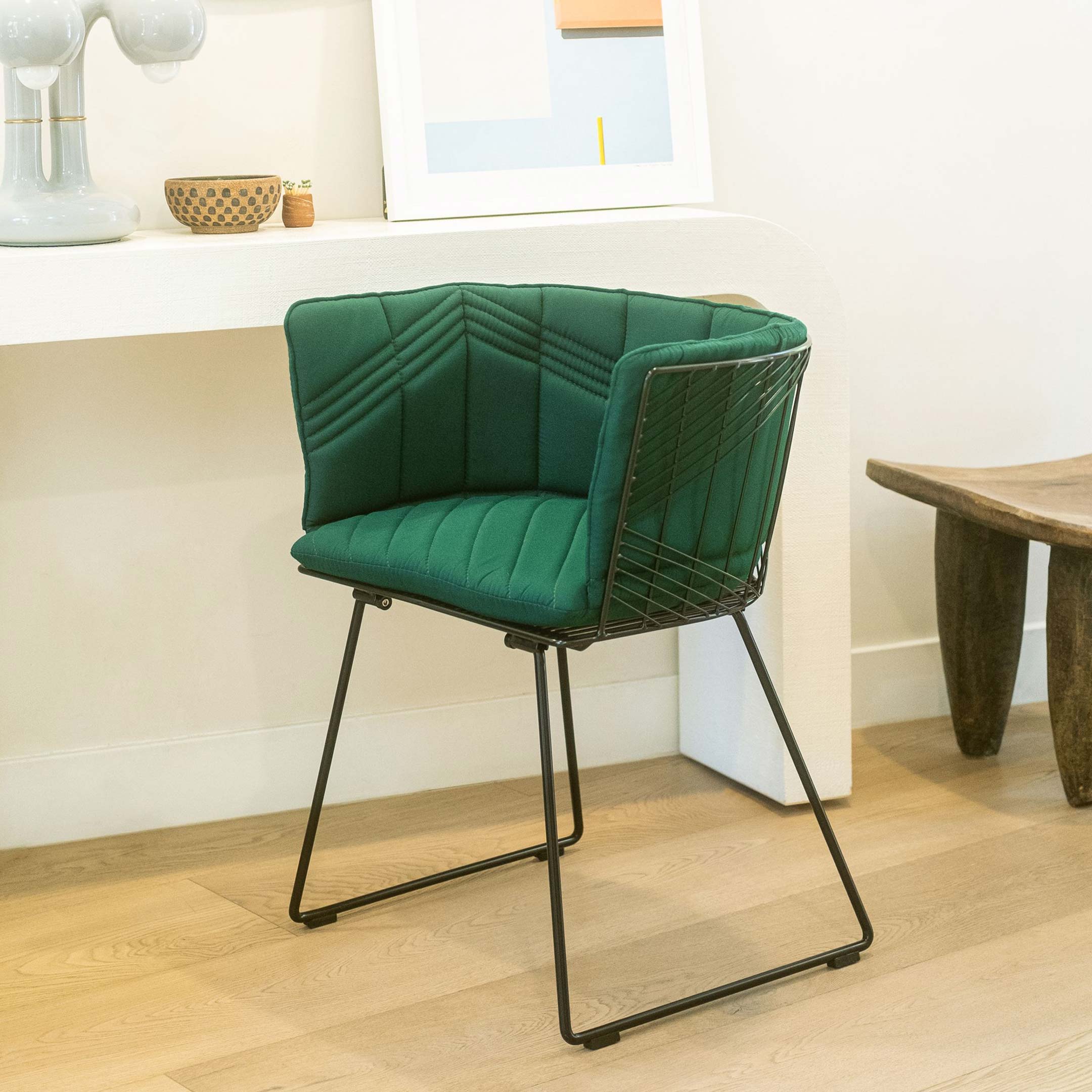 Captain Chair shown in Black with Forest Green Cover-Up Sunbrella Padding