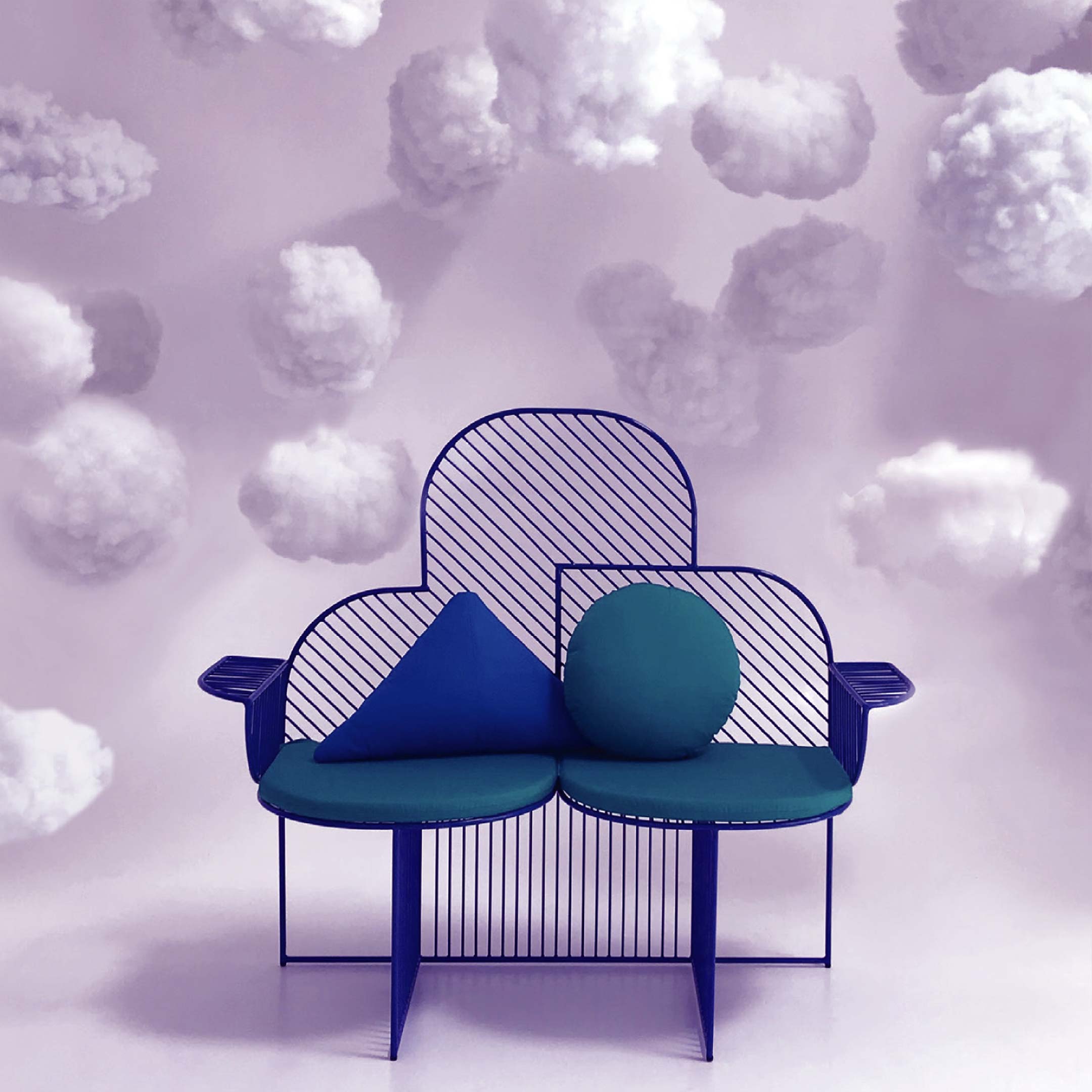 Cloud Bench shown in Electric Blue in a room filled with clouds.