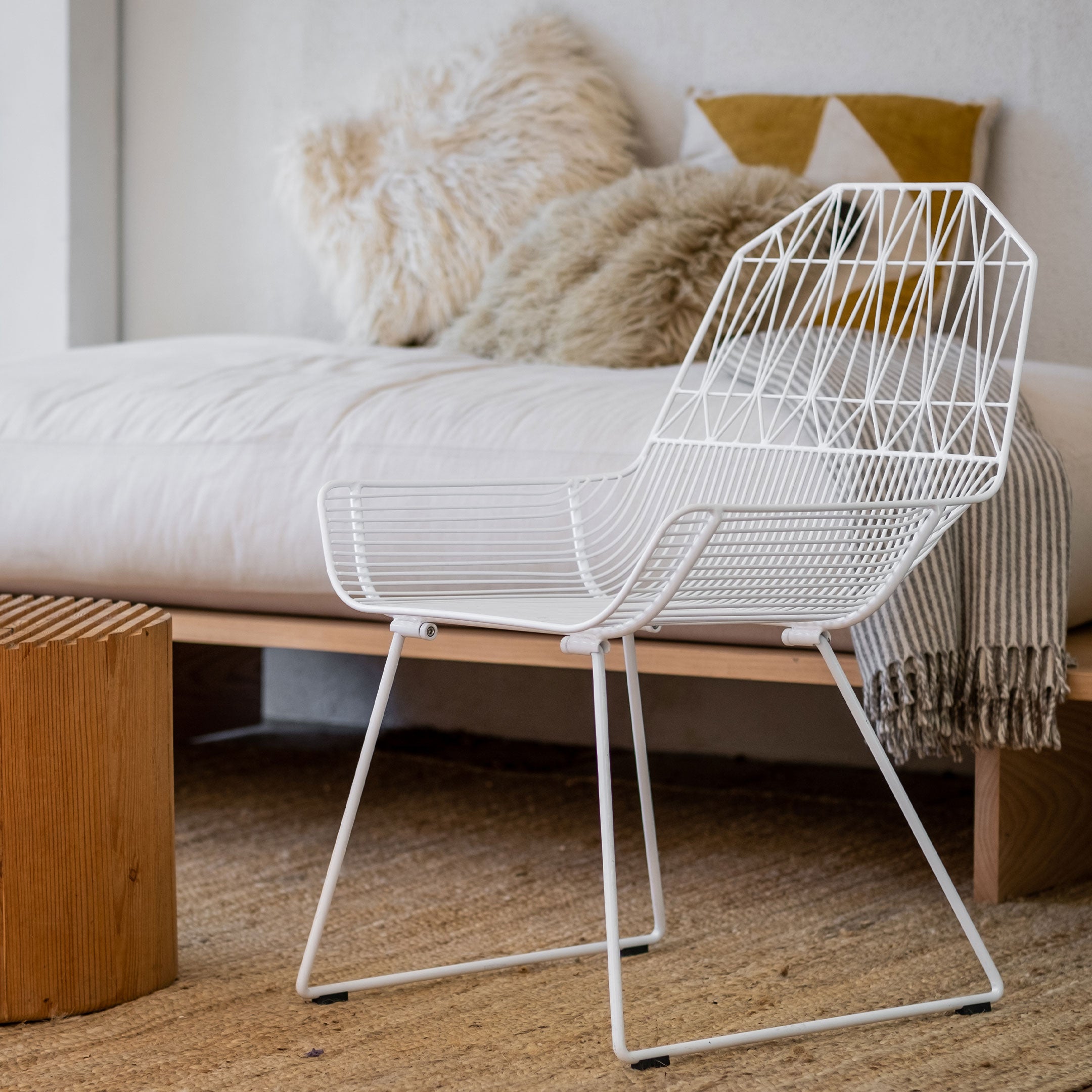 Farmhouse Lounge Chair shown in White. Pictured in patio lounge area
