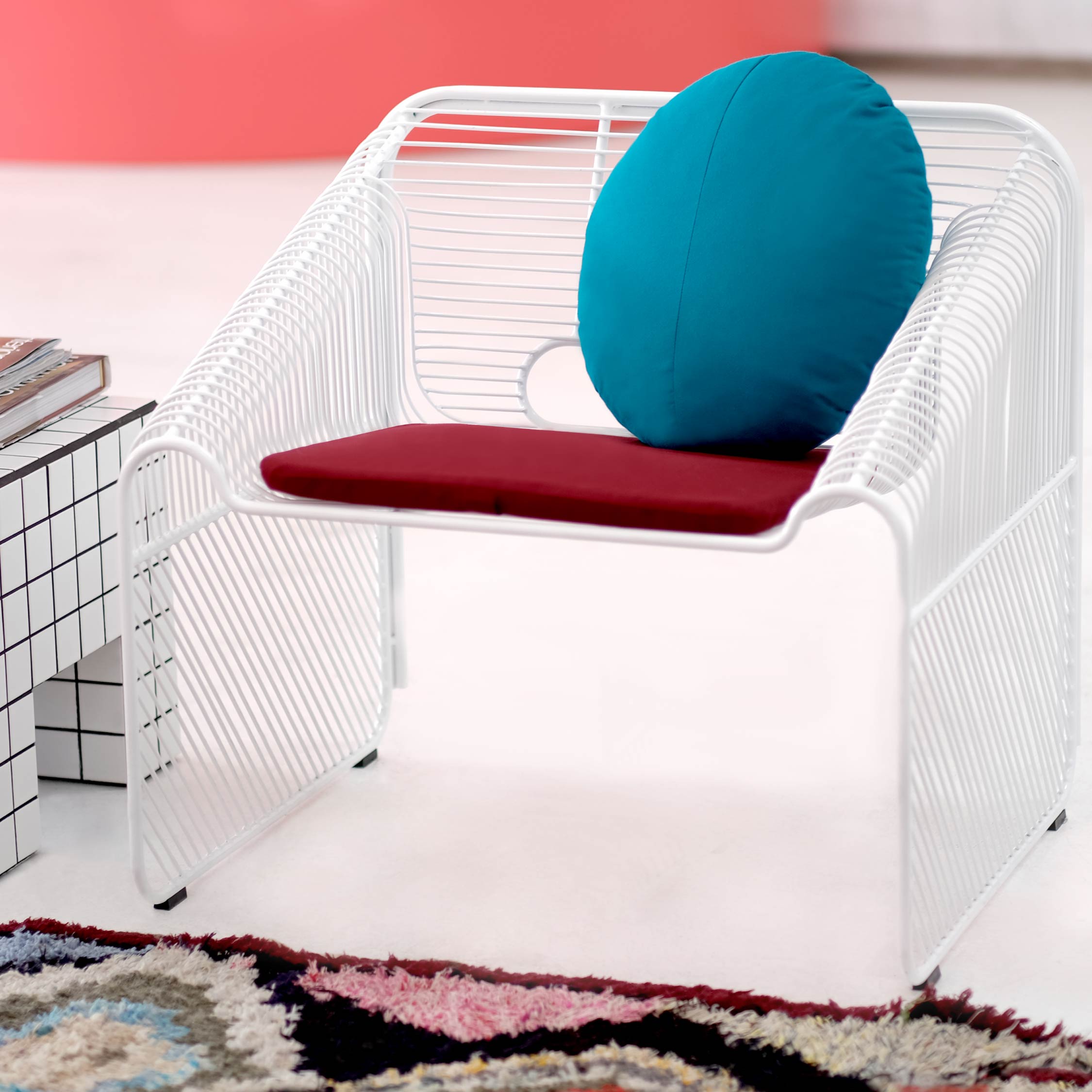 Hot Seat shown in White with Burgundy Sunbrella Padding and Teal Throw Pillow