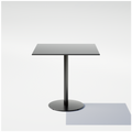 Black pedestal table with a square top, central column and circular base, three-quarter view.