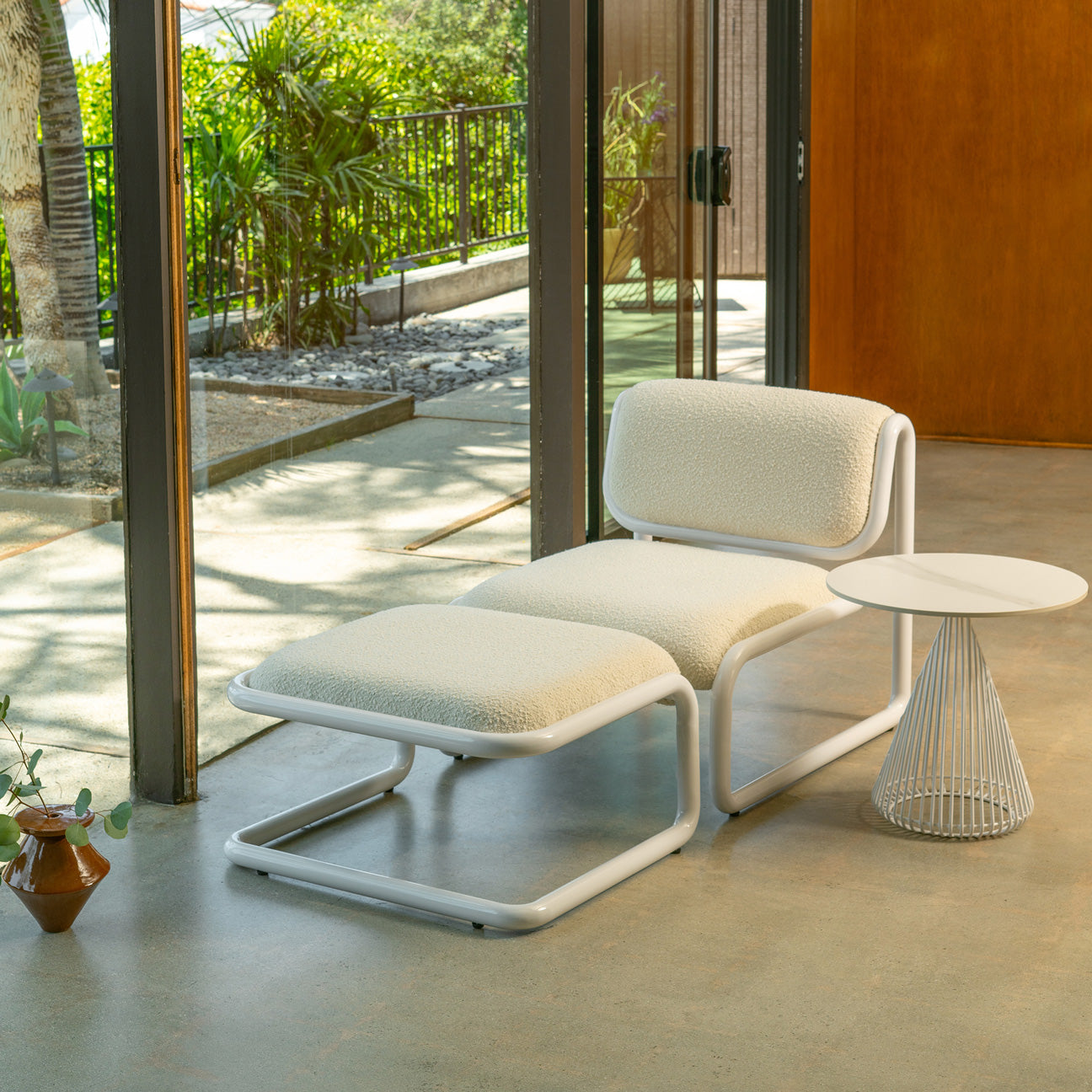 Tube Lounge Chair and Ottoman shown in White with Cream Boucle Fabric