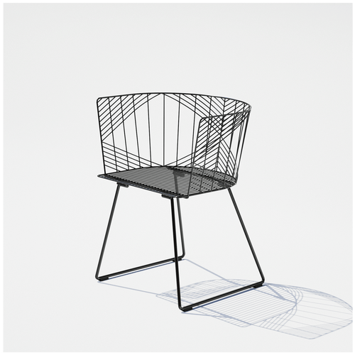 Bend Goods Cap black wire chair with sculptural curved back and minimalist metal frame.
