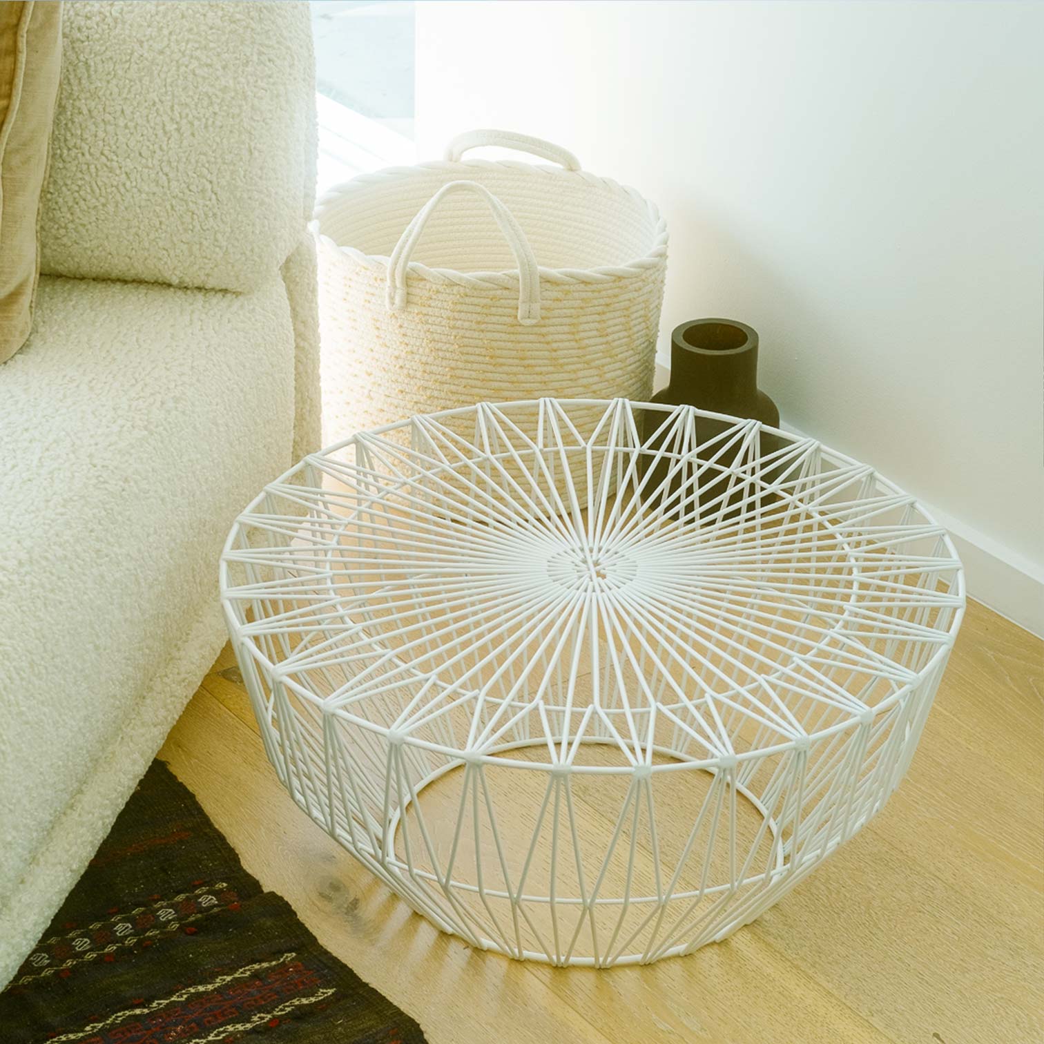 Drum Table shown in White. Pictured next to a Cube Sofa Lounge seat