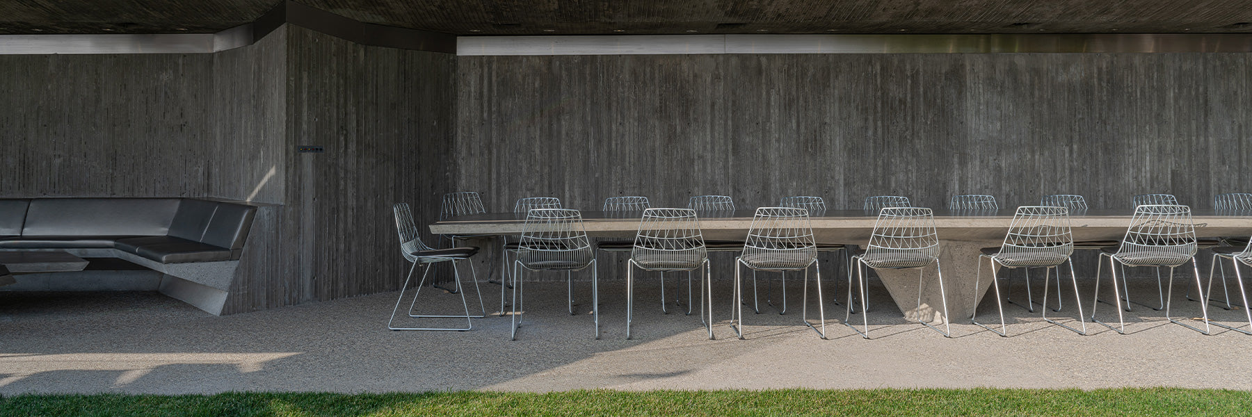 Modern concrete and glass architecture at Club James in Beverly Hills blending with hillside landscape at the Sheats Goldstein Residence