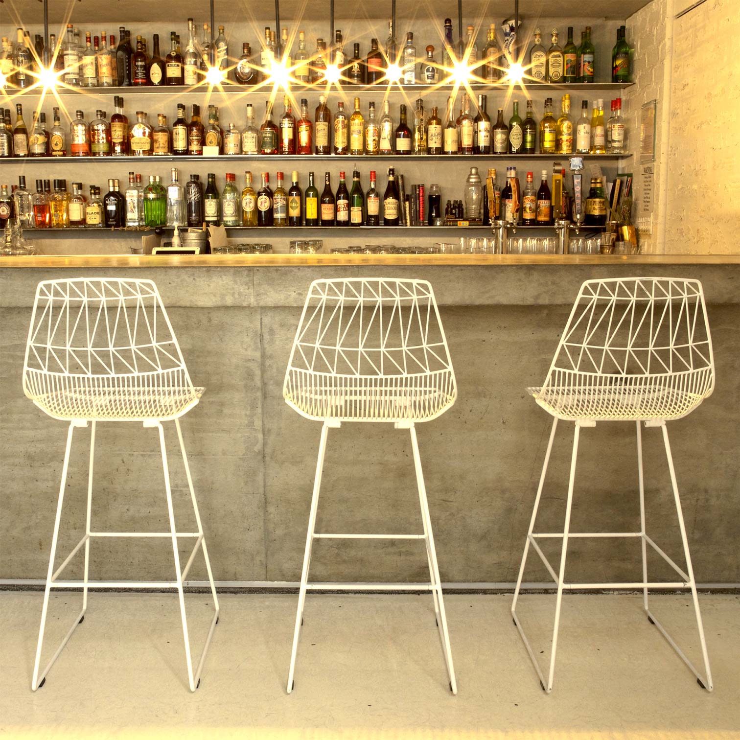 Lucy Barstools shown in White in bar area