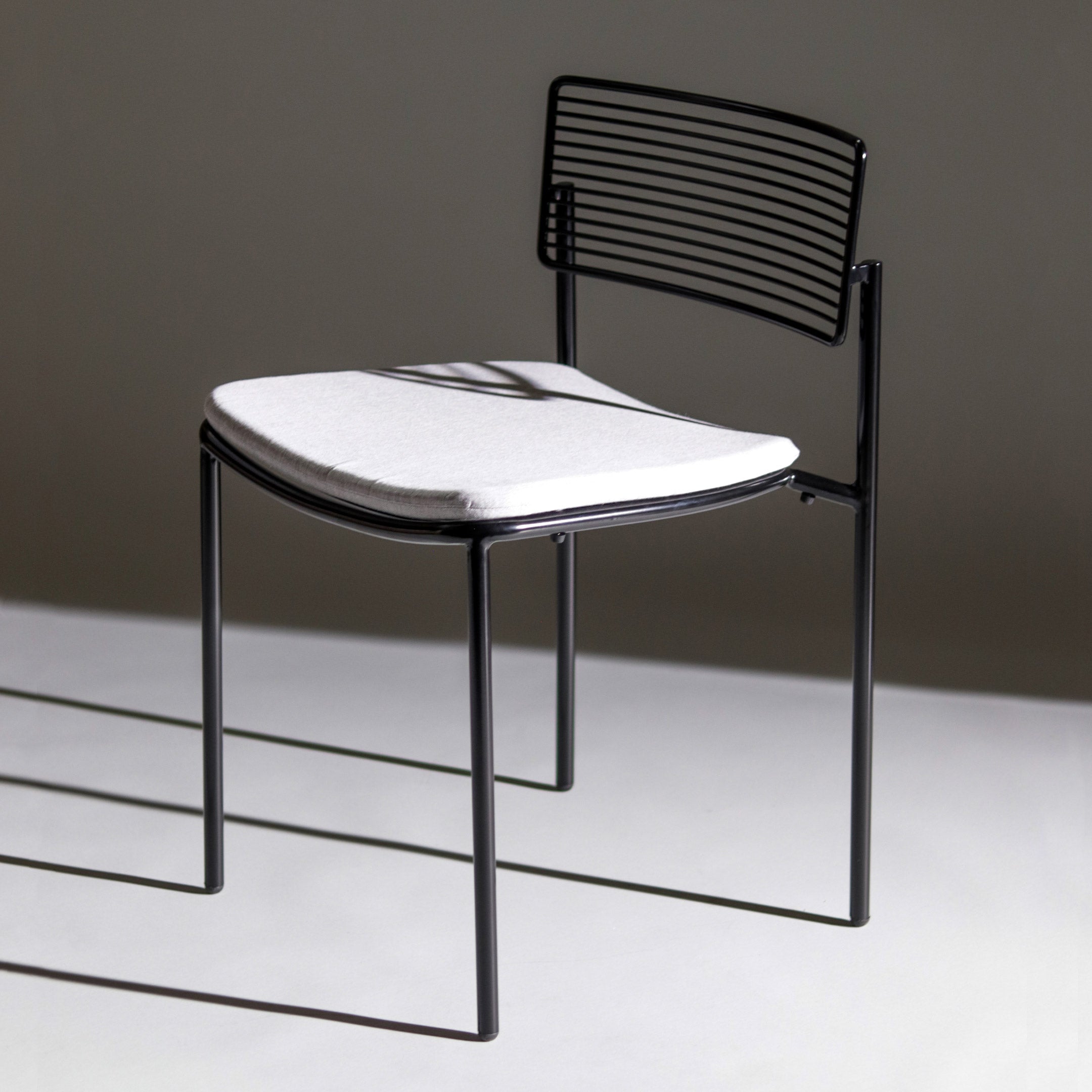 Rachel Chair shown in Black with Granite Sunbrella Padding