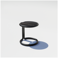 Bend Goods side table featuring a round black top and minimalist metal frame.