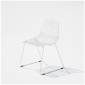 Bend Goods Stack Lucy white wire chair with geometric metal design.