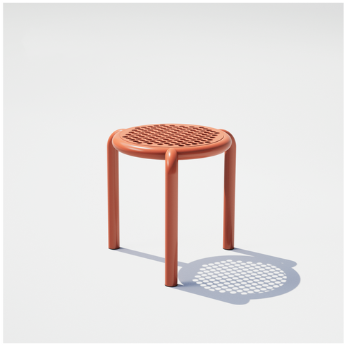 Bend Goods Tripod stool featuring a perforated round steel seat and minimalist frame.