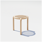 Beige stool with a circular seat and legs on a white background