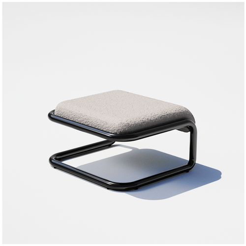 Bend Goods Tube ottoman with tan cushion and black metal frame.