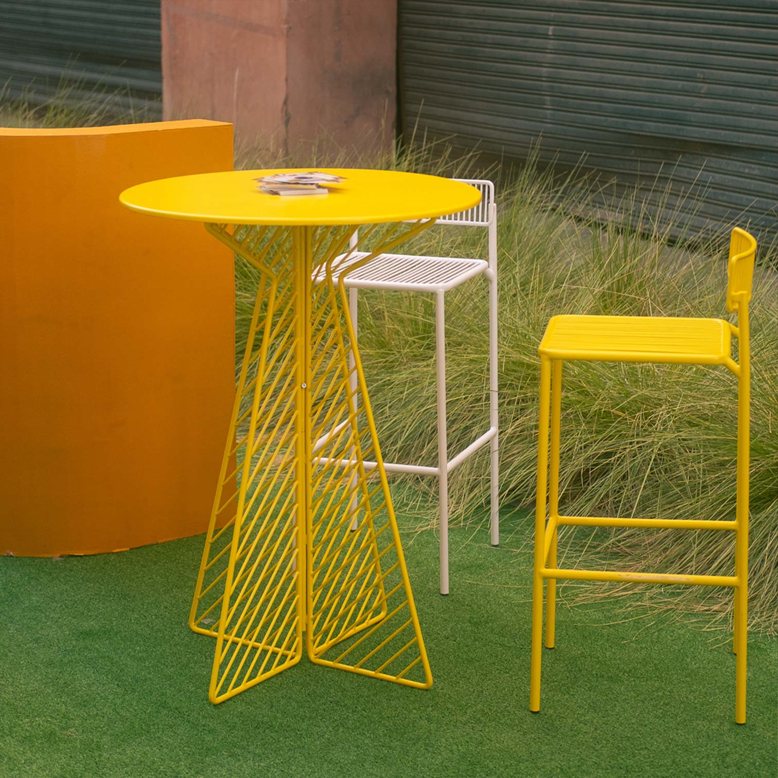 Cafe Bar Table shown in Yellow. Pictured with Rachel Barstools in Yellow and White
